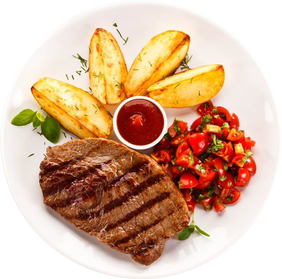 steak with potato wedges and tomatoes with sauce in middle